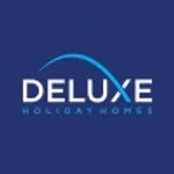 Deluxe Holiday Homes logo